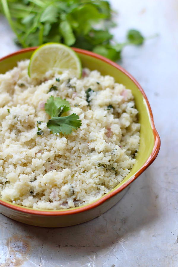 10 minute Cilantro Lime Cauliflower Rice - the perfect burrito bowl base! #paleo