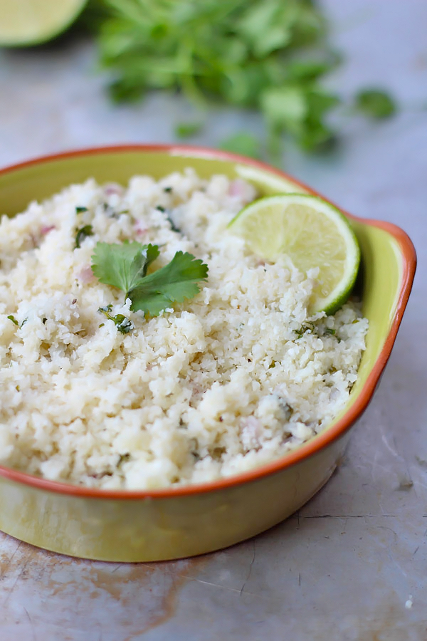 10 minute Cilantro Lime Cauliflower Rice - the perfect burrito bowl base! #paleo