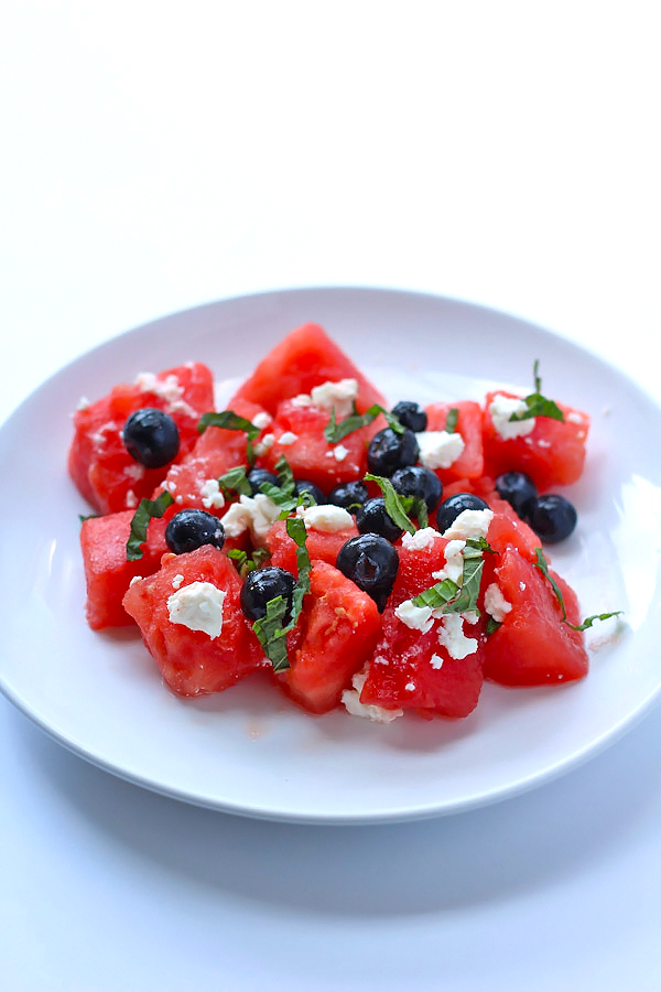 This simple watermelon salad is absolutely delicious, and only requires 5 ingredients. Perfect for any summer BBQ!