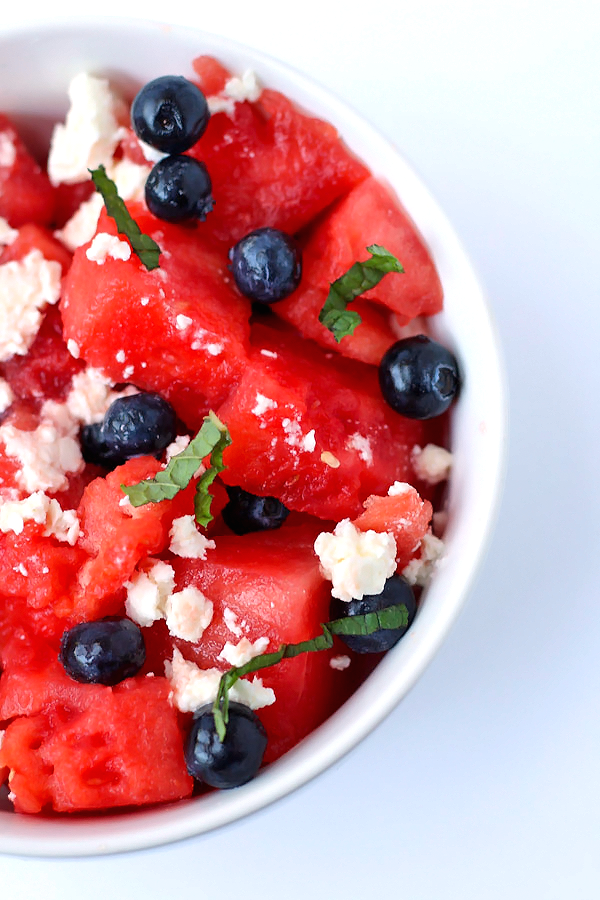 This simple watermelon salad is absolutely delicious, and only requires 5 ingredients. Perfect for any summer BBQ!