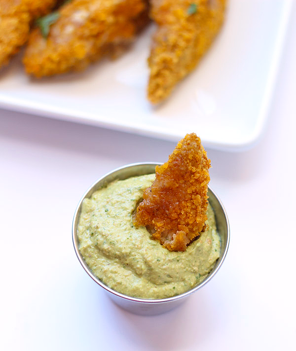 Plantain crusted chicken with Avocado Cream - AMAZING crispy baked chicken with a zesty avocado sauce!