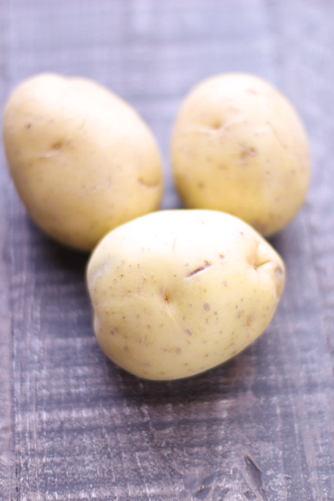 Lightened-up mashed potatoes with cashew gravy - fluffy cauliflower mashed potatoes with creamy gravy!