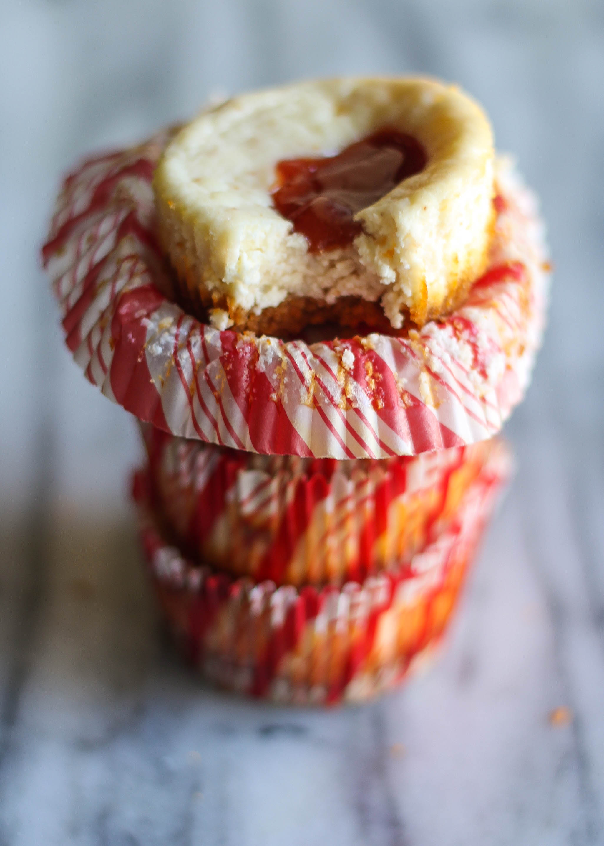 Light and creamy cheesecake atop a crunchy graham cracker crust topped with sweet, guava jam for a bite full of flavor.