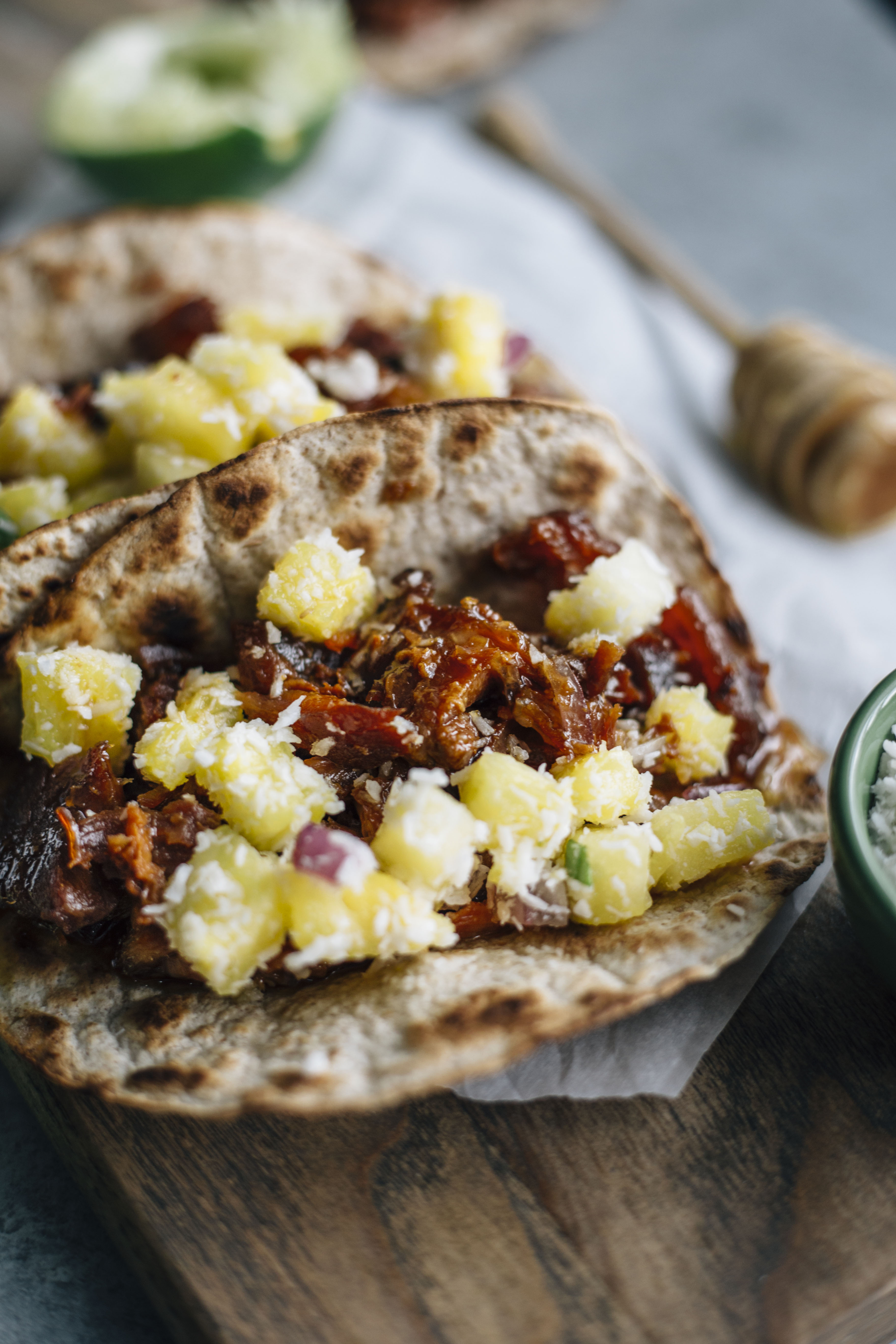 These delicious Honey Ginger Pork Tacos are made in the slow cooker and topped with a simple pineapple salsa. A sweet and simple meal for your next taco night! 