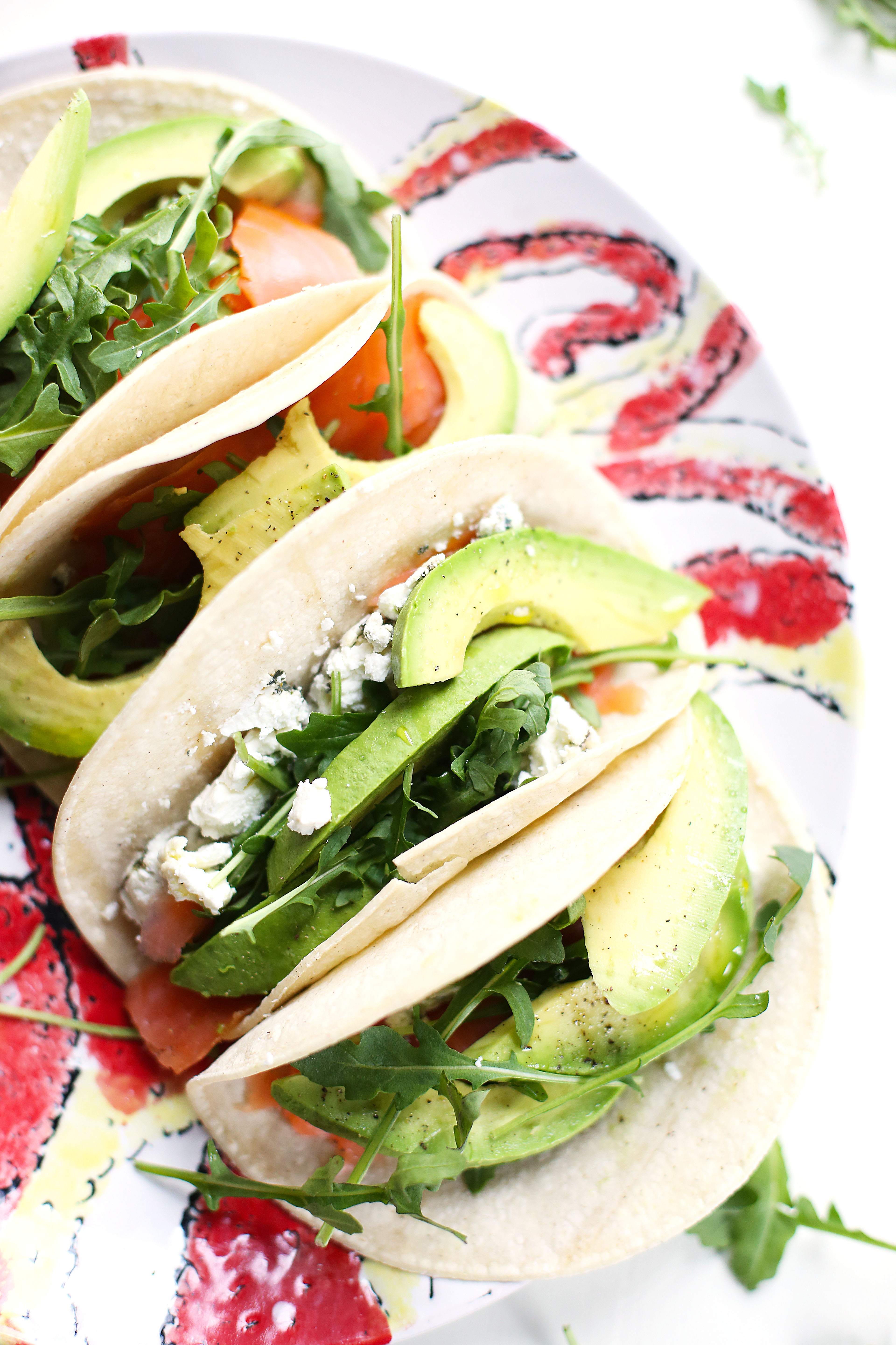 The smokey salmon and spicy arugula balances beautifully with the creamy avocado in these Smoked Salmon and Avocado Tacos.