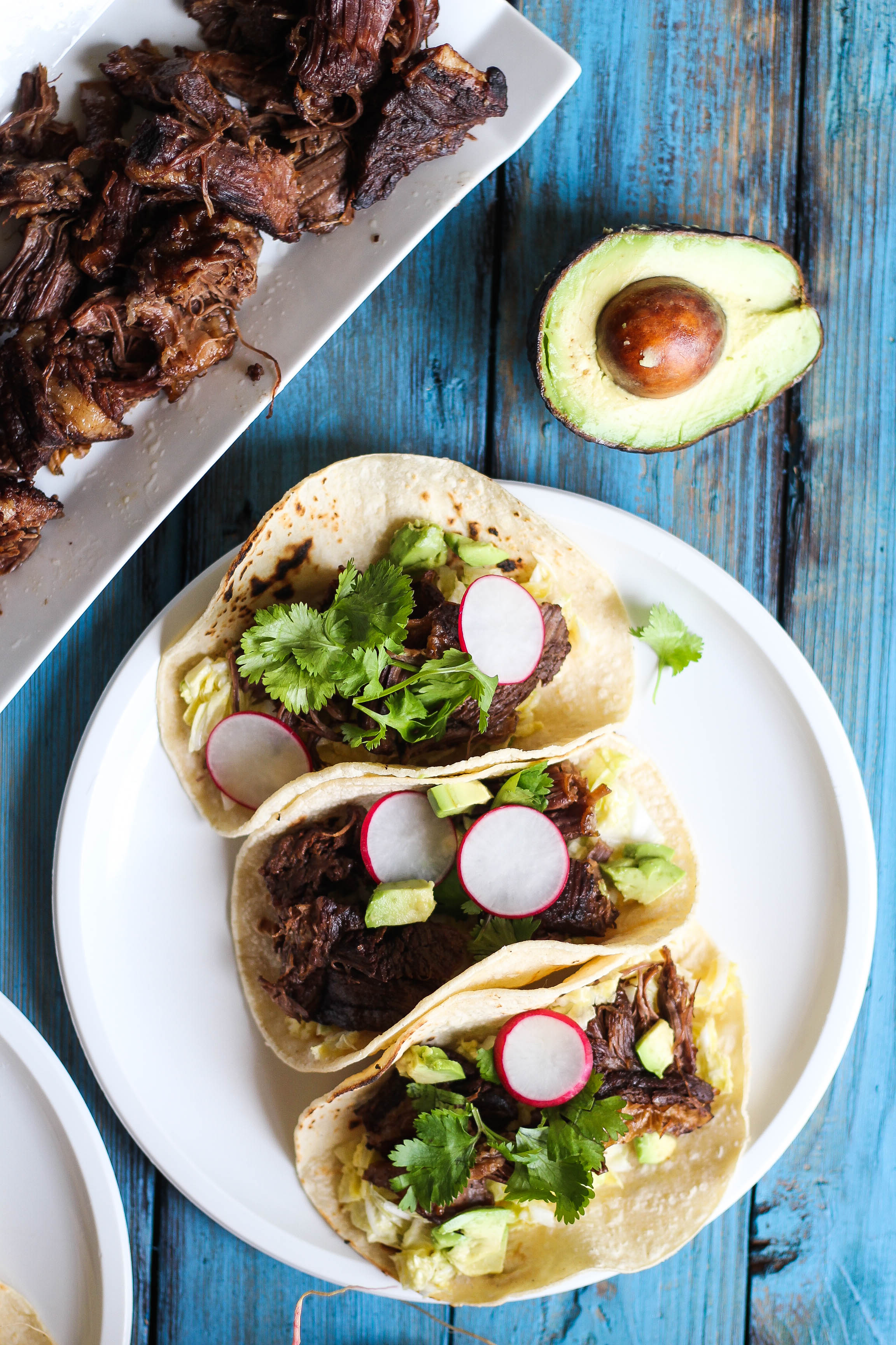Slow-cooked beef short ribs in an Asian-inspired marinade are a fun twist on a Mexican classic. Enjoy a unique marriage of textures in these simple, wholesome tacos.