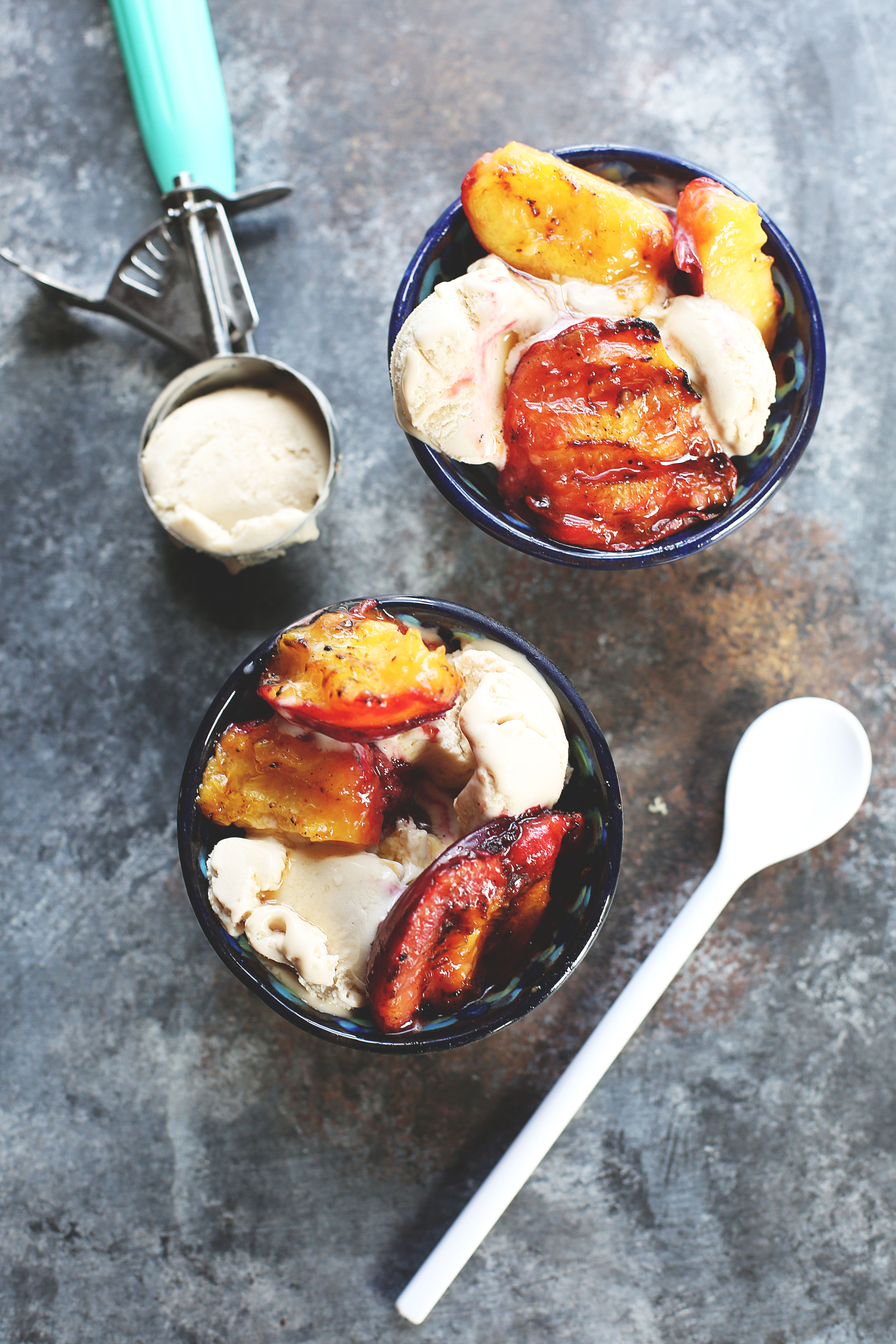 Each bite of these grilled peaches over vegan ice cream is like a little taste of summer. This simple vegan dessert is the perfect healthy treat to finish off an amazing BBQ.
